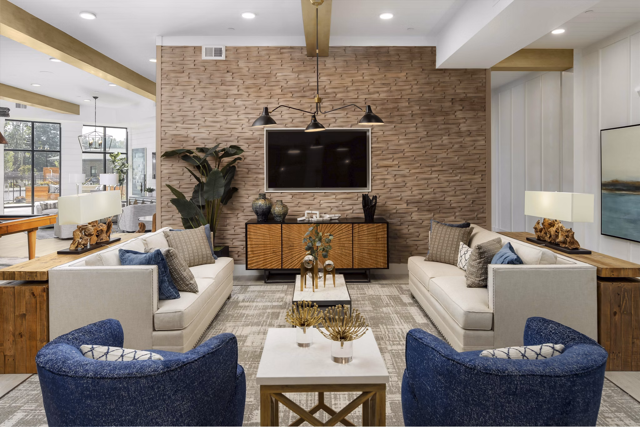Clubhouse with modern lounge and fitness center at Alta Ashley Park Apartments, a premier community offering luxury living experiences