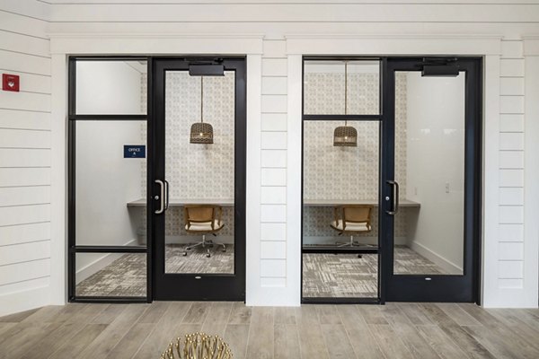 Modern club house with stylish seating at Alta Ashley Park Apartments