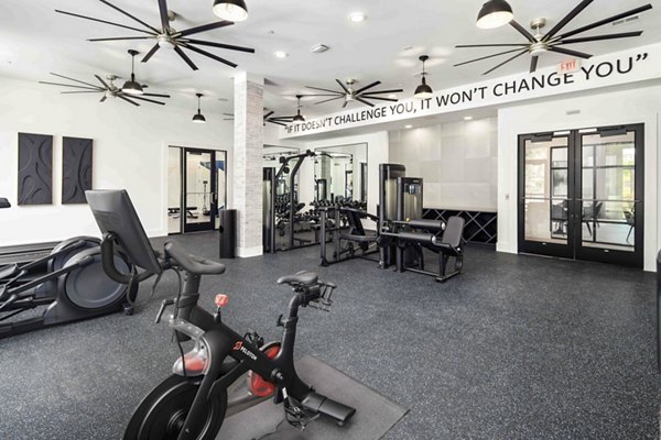 State-of-the-art fitness center with modern equipment at Alta Ashley Park Apartments for active living and wellness-focused residents