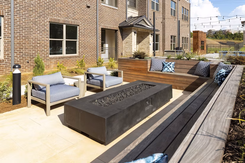 Spacious recreation area featuring modern lounge seating at Alta Ashley Park Apartments