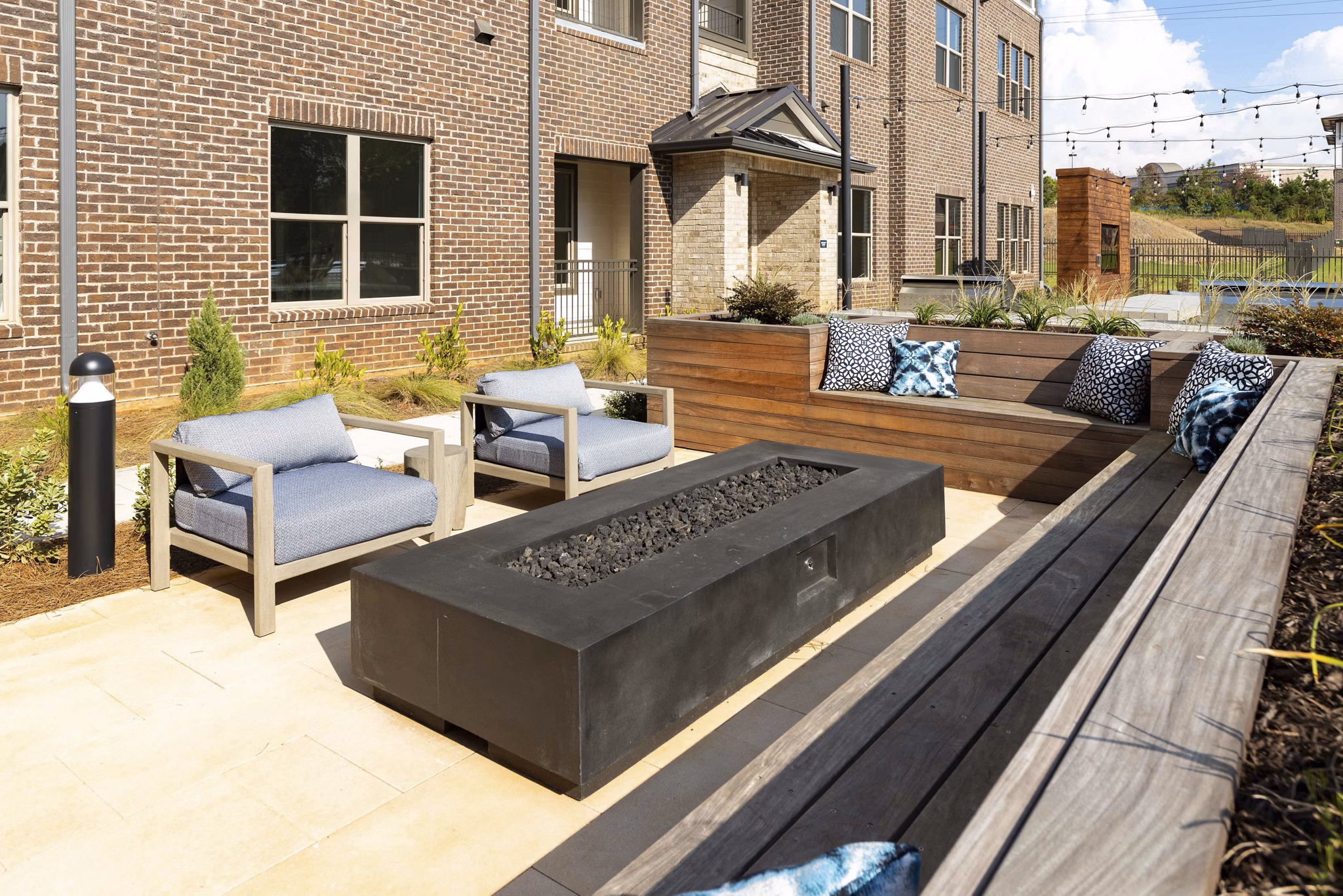 Spacious recreation area featuring modern lounge seating at Alta Ashley Park Apartments