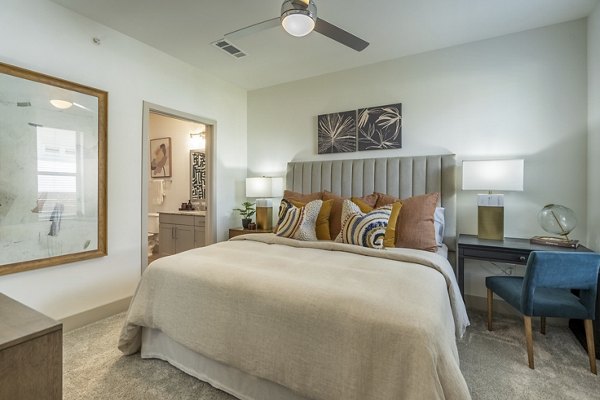 Elegant bedroom with modern decor at Alta Berry Creek Apartments
