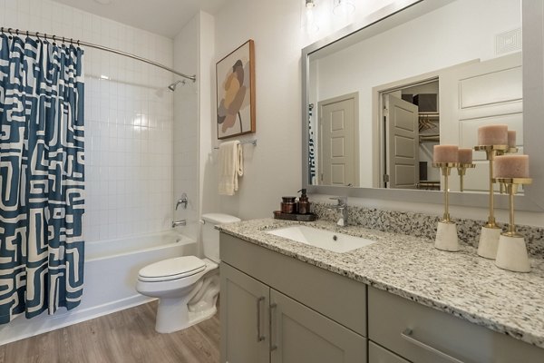 Modern bathroom with sleek fixtures at Alta Berry Creek Apartments