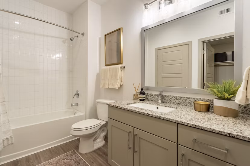 Modern bathroom with sleek fixtures at Alta Berry Creek Apartments