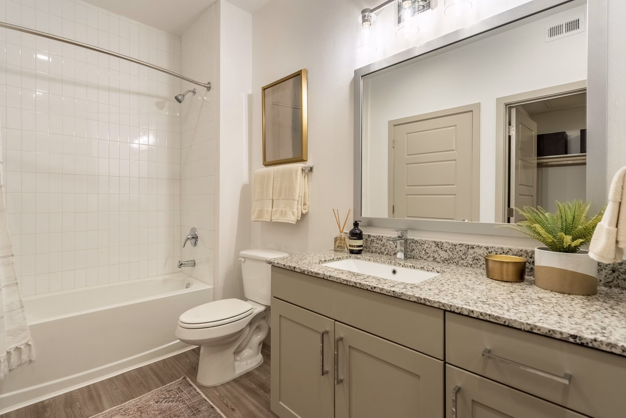 Modern bathroom with sleek fixtures at Alta Berry Creek Apartments