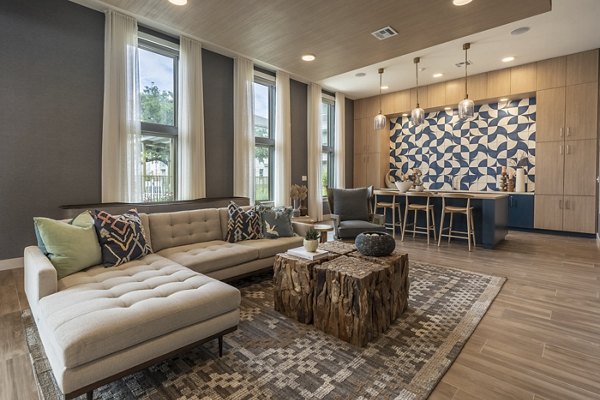 Luxurious clubhouse featuring elegant seating areas at Alta Berry Creek Apartments