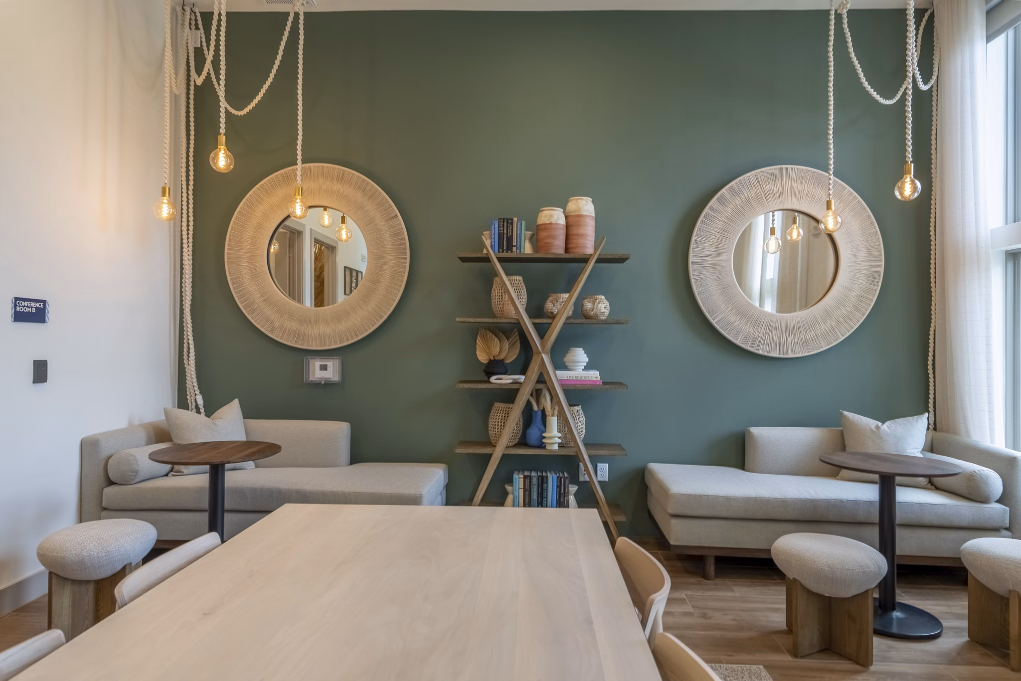 Clubhouse featuring modern seating and entertainment options at Alta Berry Creek Apartments, perfect for luxury living