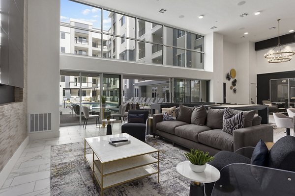 Stylish clubhouse with cozy seating and modern decor at Alta Biltmore Apartments