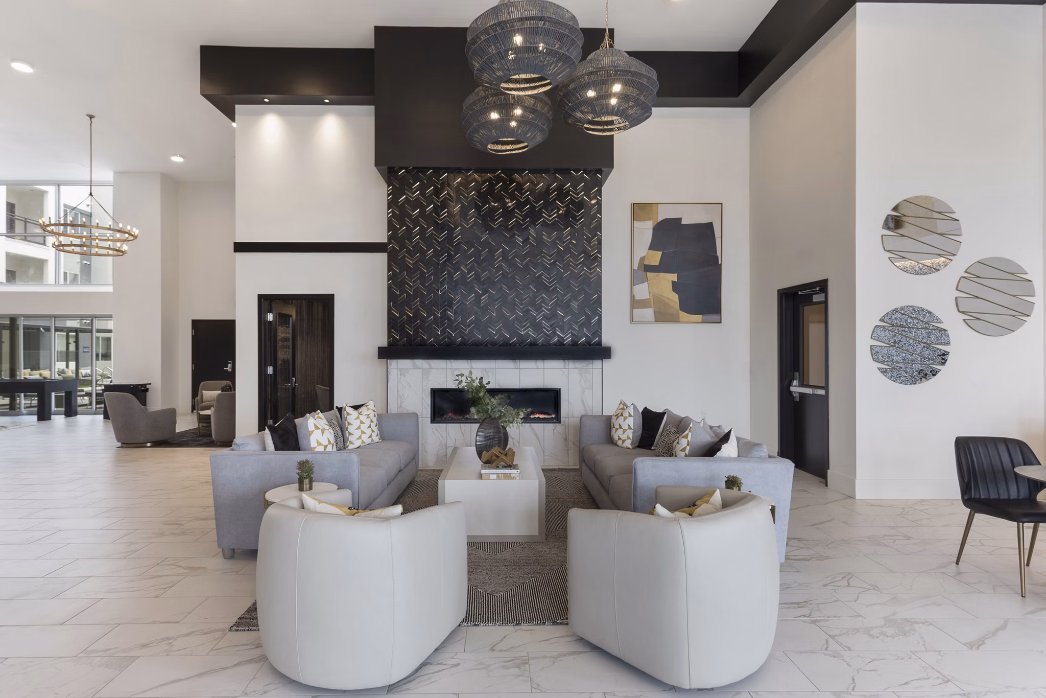 Clubhouse featuring modern design and ample seating at Alta Biltmore Apartments, luxury apartments by Greystar