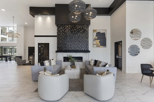 Clubhouse featuring modern design and ample seating at Alta Biltmore Apartments, luxury apartments by Greystar
