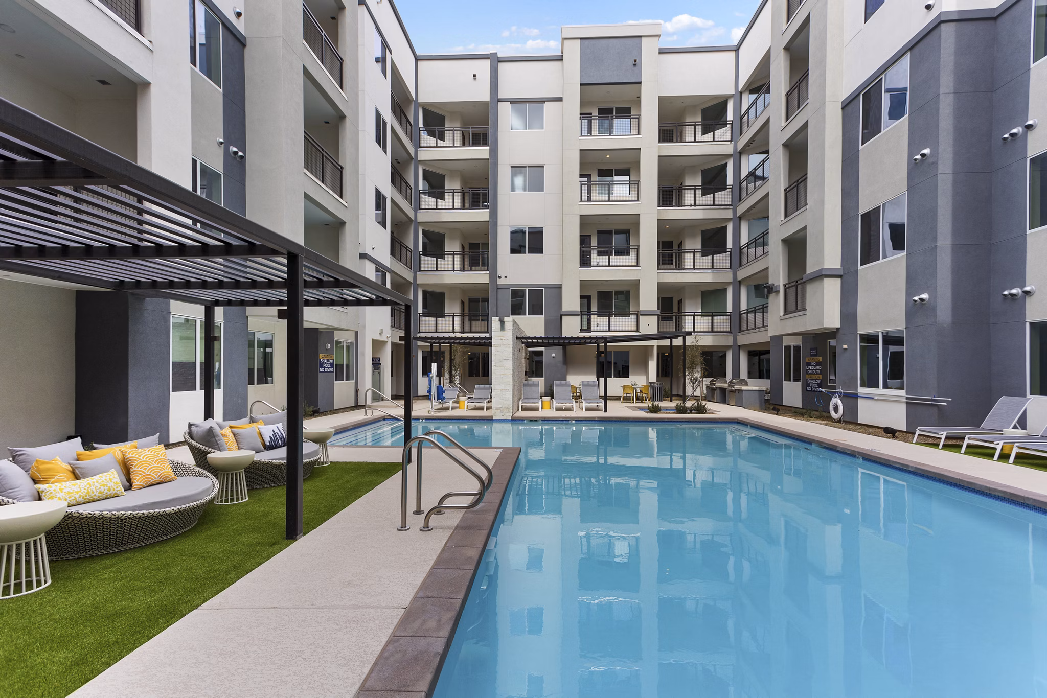 Resort-style pool at Alta Biltmore Apartments offering luxury living in Phoenix