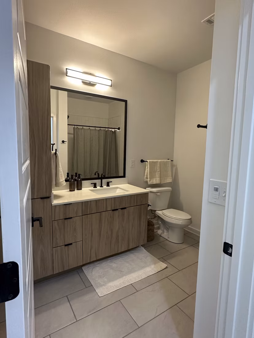 Bathroom featuring modern fixtures at Alta City Side Apartments
