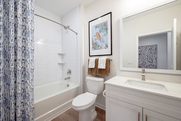 Luxury bathroom with marble countertops at Alta Citron Apartments