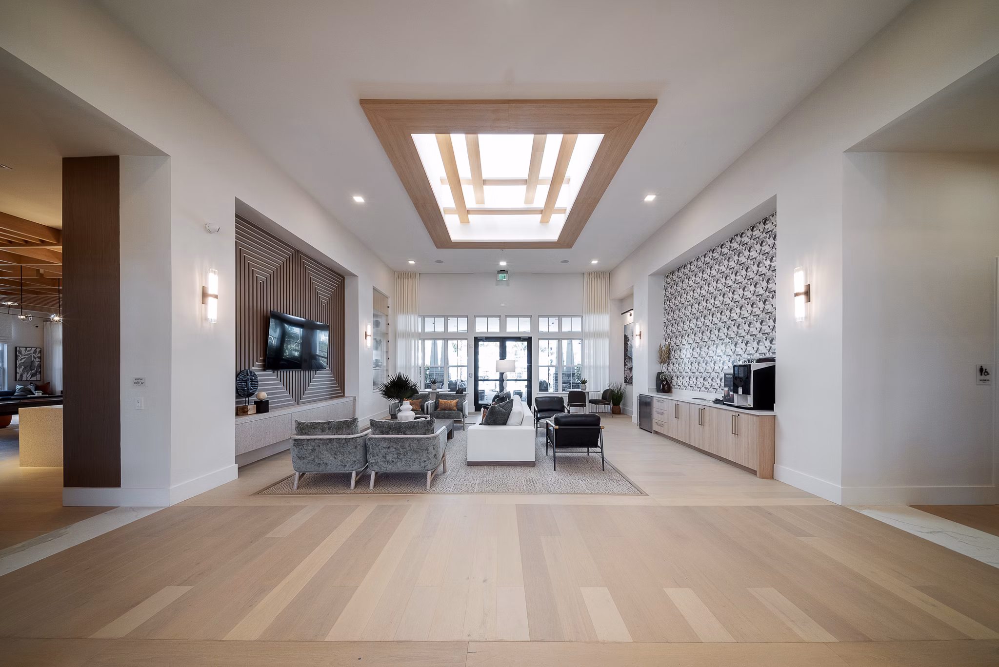 Clubroom featuring modern decor and seating options at Alta Citron Apartments