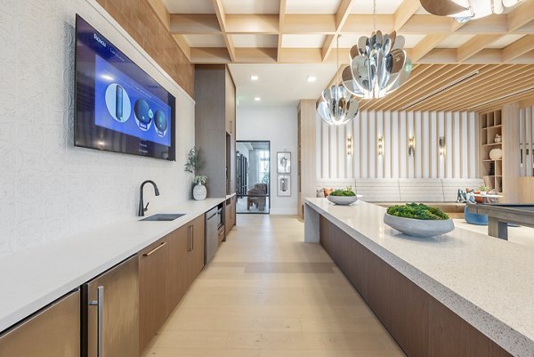 Clubroom featuring stylish seating and modern dÃ©cor at Alta Citron Apartments, a luxury living space by Greystar