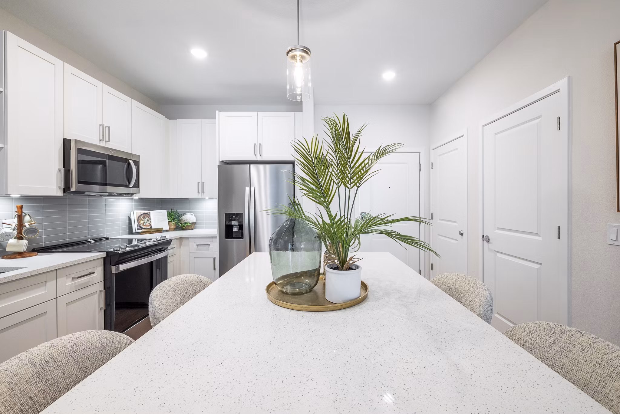 Modern kitchen with stainless steel appliances at Alta Citron Apartments luxury living