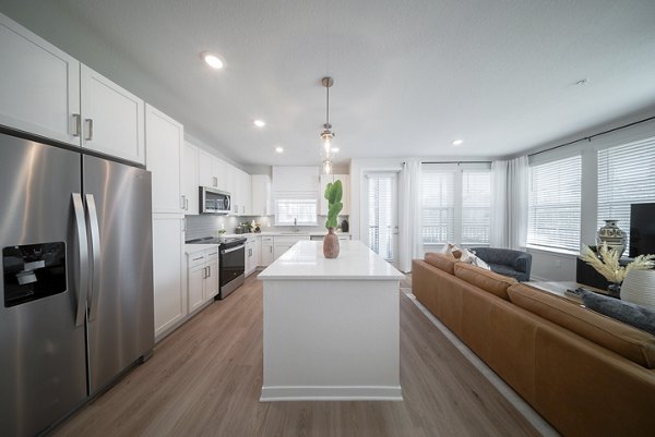 Modern kitchen with stainless steel appliances at Alta Citron Apartments