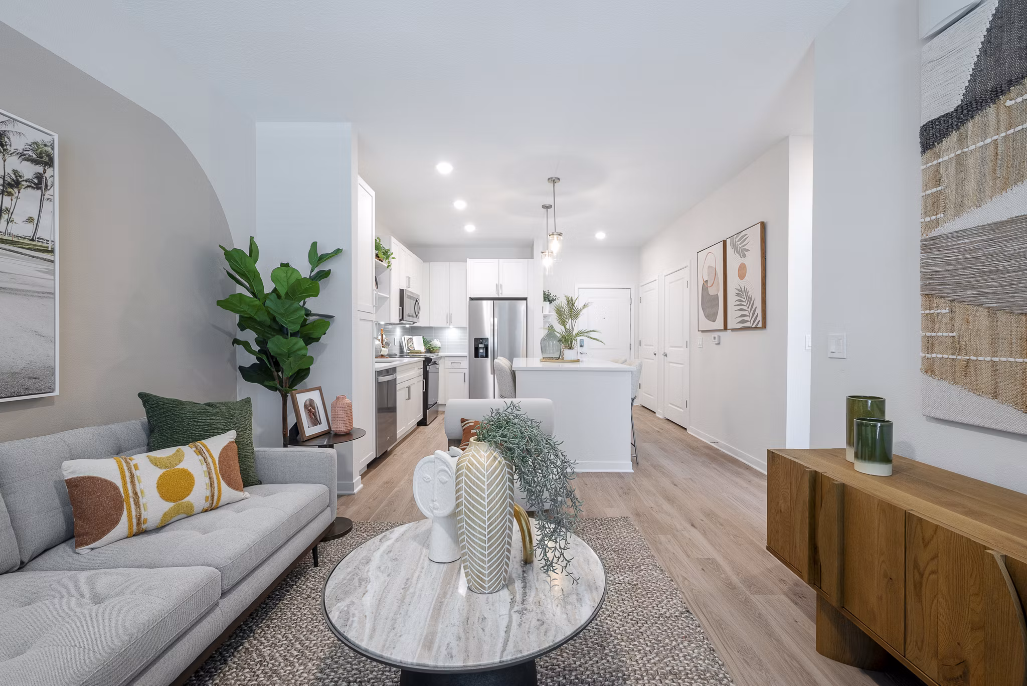 Spacious living room with modern decor and large windows at Alta Citron Apartments, luxury living with Greystar's exceptional design