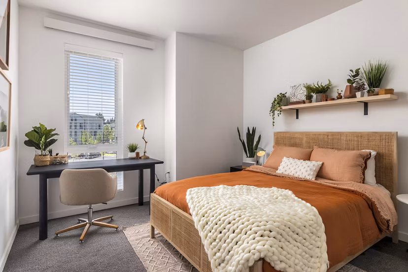 Modern bedroom with elegant furnishings at Alta Civic Station luxury apartments
