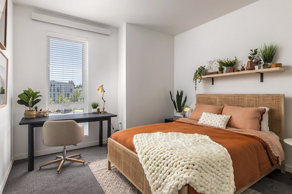 Modern bedroom with elegant furnishings at Alta Civic Station luxury apartments