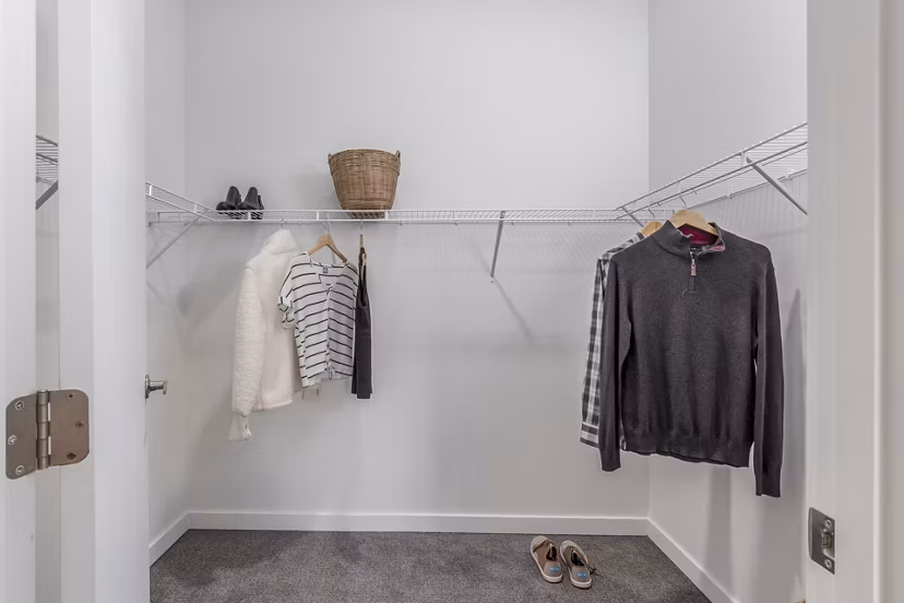 Cozy bedroom with modern furnishings at Alta Civic Station apartments