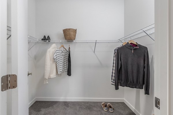 Cozy bedroom with modern furnishings at Alta Civic Station apartments