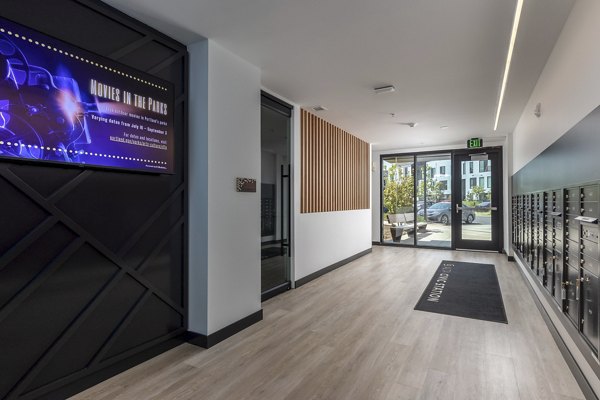 Clubhouse featuring modern lounge and entertainment areas at Alta Civic Station luxury apartments