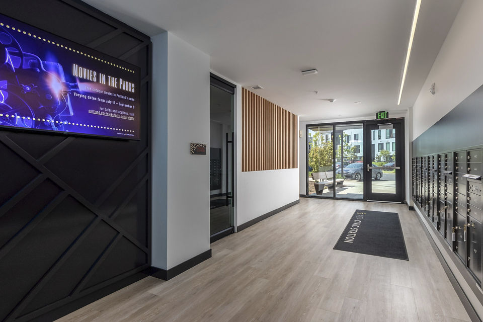 Clubhouse featuring modern lounge and entertainment areas at Alta Civic Station luxury apartments
