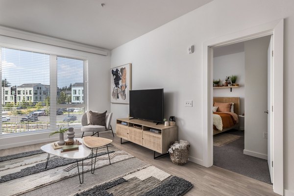 Modern living room with elegant furnishings at Alta Civic Station luxury apartments