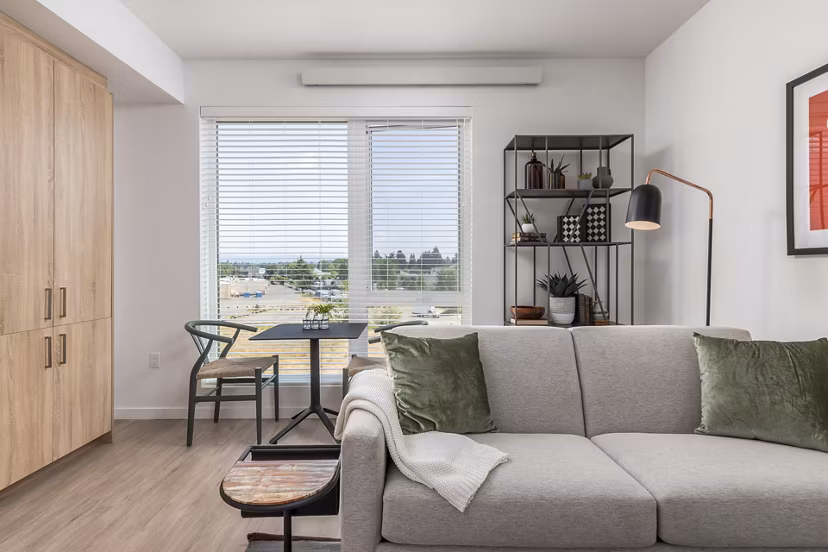Spacious living room with modern furnishings at Alta Civic Station luxury apartments