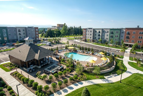 Panoramic hill views from a modern high-rise at Alta Clara at the Fells Apartments
