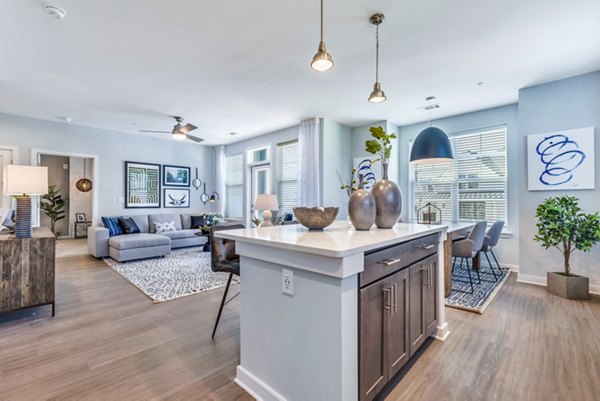 Modern kitchen with stainless steel appliances at Alta Croft Apartments, luxury community in Charlotte