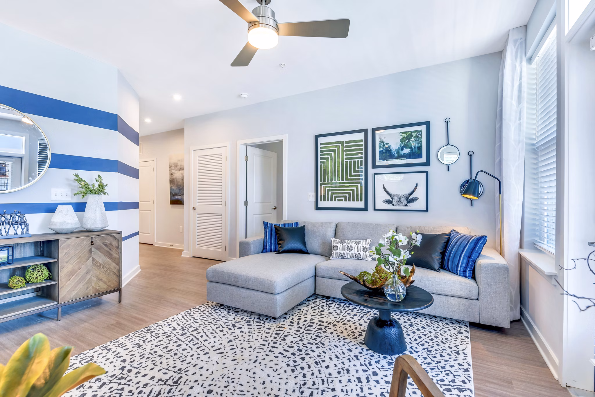 Spacious living room with contemporary furnishings at Alta Croft Apartments
