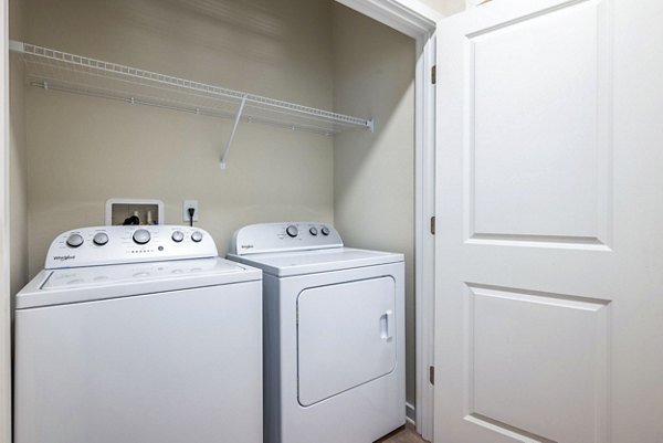 laundry room at Alta Cypress Apartments