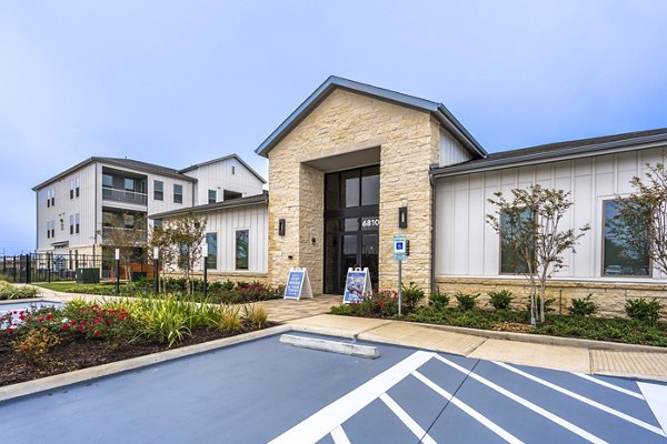Clubhouse featuring modern decor and seating at Alta Cypress Springs Apartments