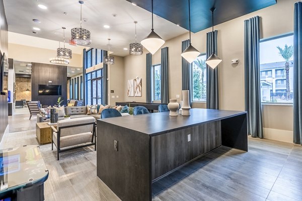 Clubhouse with modern lounge and communal spaces at Alta Cypress Springs Apartments