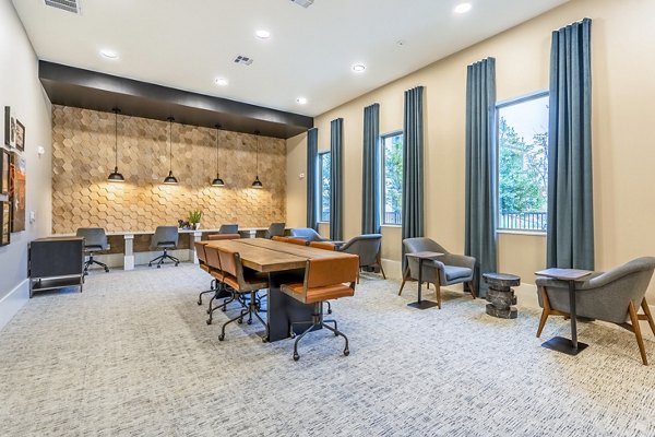 Modern business center with ergonomic workstations at Alta Cypress Springs Apartments