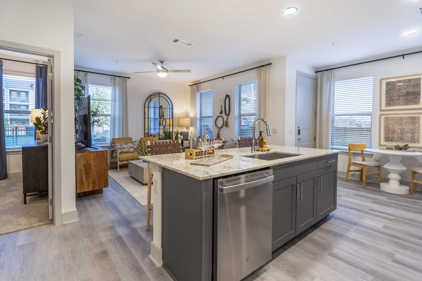 Modern kitchen with stainless steel appliances at Alta Cypress Springs Apartments