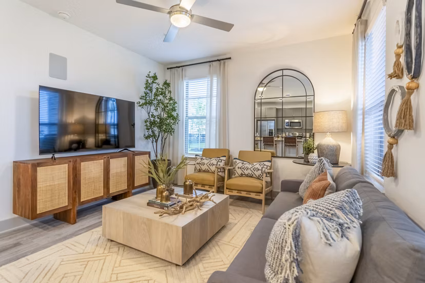 Living room with modern decor and natural light at Alta Cypress Springs Apartments