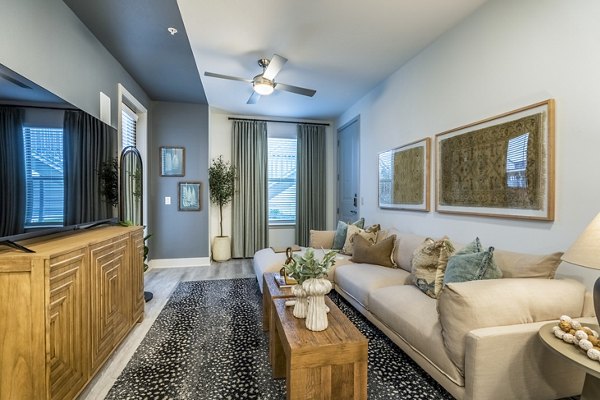Spacious living room with modern decor at Alta Cypress Springs Apartments