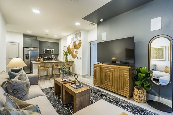 Living room featuring elegant dÃ©cor and ample natural light in Alta Cypress Springs Apartments