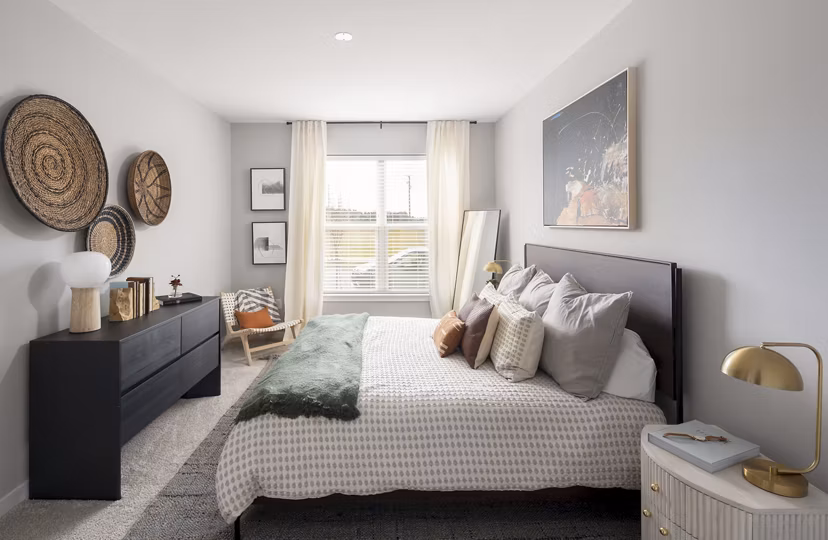 Contemporary bedroom with stylish decor in Alta Davis Apartments