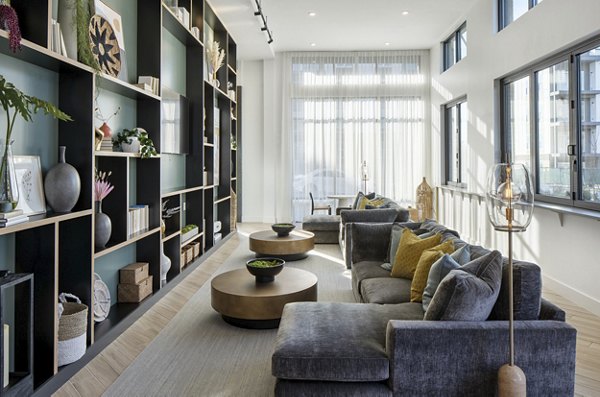 Modern clubhouse with sleek furnishings at Alta Davis Apartments, offering luxury amenities and stylish spaces for community gatherings