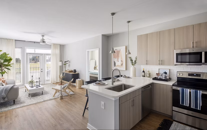 Modern kitchen with stainless steel appliances at Alta Davis Apartments