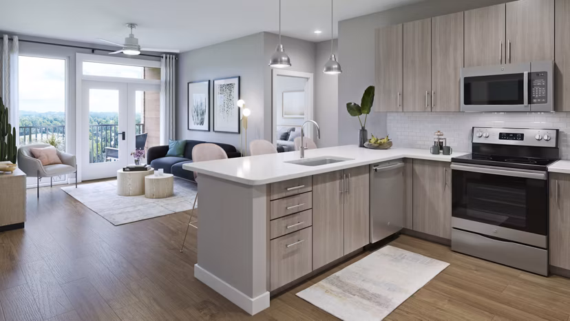 Modern kitchen with stainless steel appliances in Alta Davis Apartments