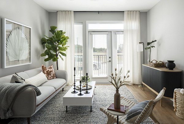 Cozy living room with modern furnishings at Alta Davis Apartments