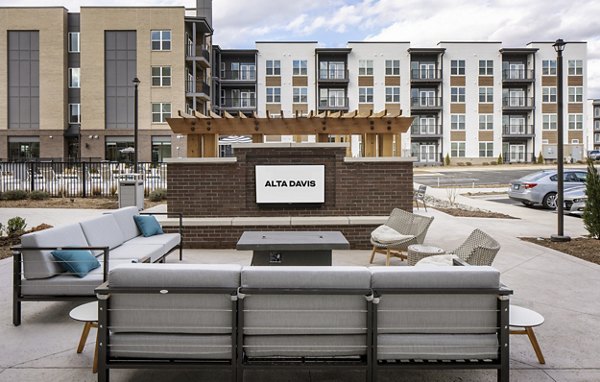 Cozy outdoor fire pit on the patio at Alta Davis Apartments
