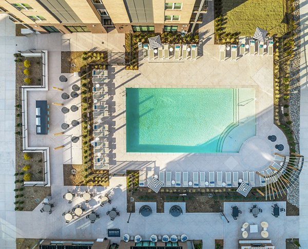Sun-kissed outdoor pool at Alta Davis Apartments offering luxury living experiences
