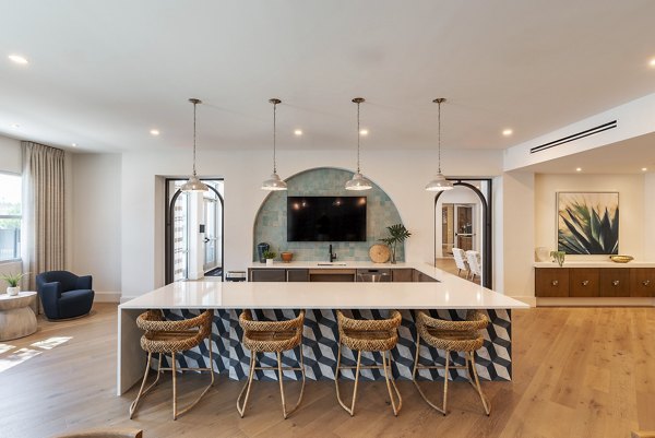 Clubhouse with stylish seating and modern decor at Alta Deco Apartments