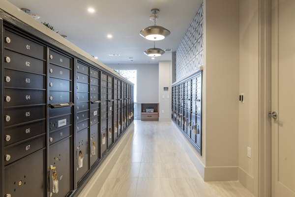 Clubhouse featuring modern decor and seating at Alta Deco Apartments, a luxury community